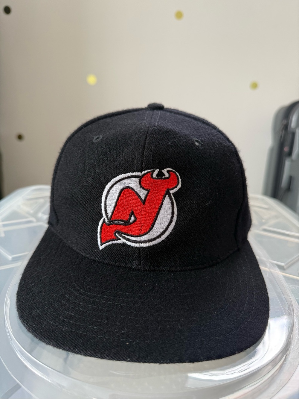 American Needle Black Hat with Red and White Logo